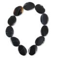 Perlina Black Agate oliva piana attorcigliata mm. 35x25 x1