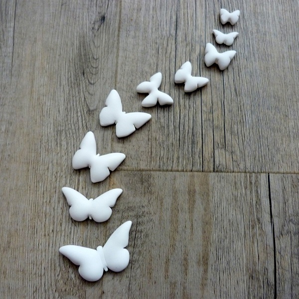 Fai da te effetto sbarramento 3D di farfalle creati con un modello per fimo