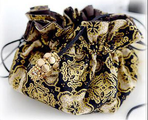 perle ilos puca gold pochette bijoux