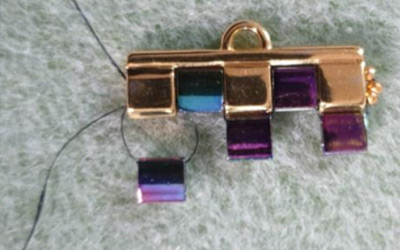 Bracciale polsino multirow in perline di Tila, perline rotonde in vetro ceco e perline 15 : Tappa 6