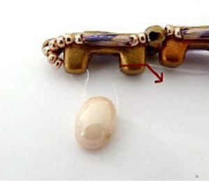 Passo 12 - Fai da te Tinaya collana perle di vetro Puca