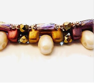 Passo 14 - Fai da te Tinaya collana perle di vetro Puca