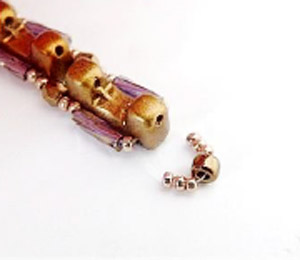 Step 8 - Fai da te Tinaya collana perle di vetro Puca