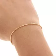 Catena con palline mm. 1.5 dorado con oro fino x m. 1