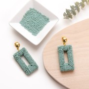 Orecchini mezze-palline mm. 10 dorato con oro fino x2