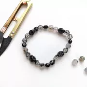 Perla testa di morte 8x6 mm imitazione Howlite tinta - Marrone x1