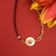 Distanziatore tondo perla d'acqua dolce stella marina e Ossido di zirconio 12mm Dorato x1