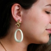 Ciondolo ovale cavo in resina 44x33 mm - Turchese marmorizzato x1