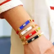 Perla tubo curvo in resina epossidica e ossido di zirconio 33x8 mm occhio - Dorato- Nero x1