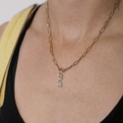 Pendente Love con ossidi di zirconio 26x7mm - Acciaio inossidabile 316L dorato x1