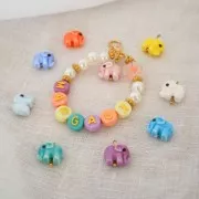 Perline rondelle a fiore 6 mm - Acciaio inossidabile 316L placcato oro x5