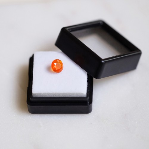 Opale di fuoco rotonda 6,1 mm - 0,5 carati