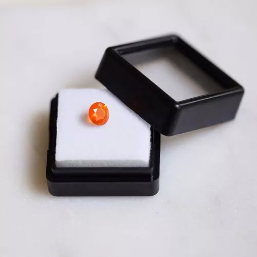 Opale di fuoco rotonda 6,1 mm - 0,5 carati