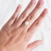 Opale ovale etiope 9,6x7,9 mm - 1,28 carati