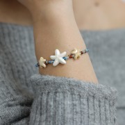 Perle di stelle marine in ceramica da 17 mm - Bianco iridescente x5