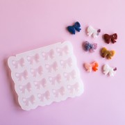 Stampo in silicone Géa Creations per la creazione di ciondoli a forma di fiocco 14x17 mm x1
