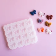 Stampo in silicone Géa Creations per la creazione di ciondoli a forma di fiocco 14x17 mm x1