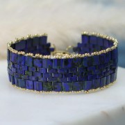 Perline Miyuki Half Tila 5x2,3x1,9 mm HTL-457 - Bronzo scuro metallizzato confezione da 100g