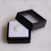 Opale ovale australiano 9,7x7,9 mm - 1,20 carati