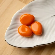 Perlina piatta irregolare 22x17 mm in resina opaca - Arancione x1