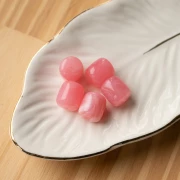 Perle tubolari 12x11 mm in resina traslucida - Rosa scuro marmorizzato x6