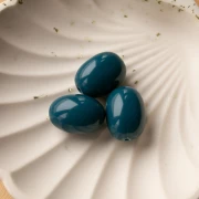 Perla d'oliva 21x15 mm in resina opaca - Blu pavone x1