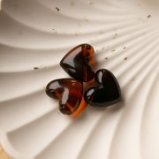 Perla cuore in resina trasparente 15,5x18 mm - foro orizzontale - Ambra marmorizzata x1