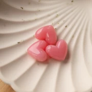 Perla cuore 15,5x18 mm in resina traslucida - foro orizzontale - rosa scuro marmorizzato x1