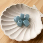 Perla cubica irregolare 15x13 mm in resina trasparente - Blu Celadon x1