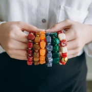 Perla cubica irregolare 15x13 mm in resina trasparente - Arancione x1