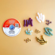 Mes bijoux fai da te - Kit di 4 braccialetti elastici con perline tubolari - Versione oro