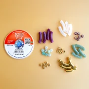 Mes bijoux fai da te - Kit di 4 braccialetti elastici con perline tubolari - Versione oro