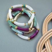 Mes bijoux fai da te - Kit di 4 braccialetti elastici con perline tubolari - Versione oro