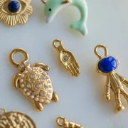 Ciondolo a mano 15x5,5 mm motivo occhi e strass - Acciaio inossidabile 304 Dorato x1