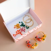 I miei gioielli fai-da-te - Versione arancione del kit di perle che girano a fiore creolo