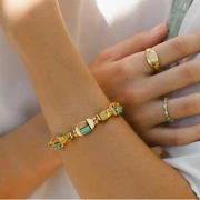 Perla a mezzaluna 5x10 mm - doppio foro - Dorata con oro fino x1