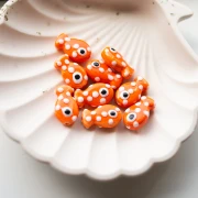 Perlina in ceramica a pois 19x11,5 mm - Arancione - Bianco x1