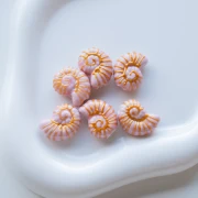 Conchiglia in ceramica perla chiocciola 21,5x16,5 mm - Rosa - Oro x1