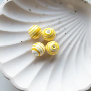Perline rotonde in ceramica a righe 12 mm - Bianco - Giallo x4