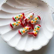 Perla Santiag - Stivale da cowboy 24x17 mm in vetro - Motivo frutta - Rosso - Pesca