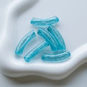 Perle tubolari curve 32x8 mm in acrilico trasparente - Blu Brillantini Argento x6
