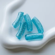 Perle tubolari curve 35x11 mm in acrilico trasparente - Blu Brillantini Argento x6