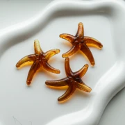 Perla di stella marina in acrilico 37x43 mm - Marrone x1