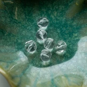 Perla rotonda irregolare sfaccettata da 10 mm in resina trasparente - Crystal x6