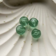 Perla rotonda irregolare sfaccettata da 12 mm in resina trasparente - Verde muschio x4