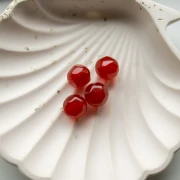 Perla rotonda irregolare sfaccettata da 12 mm in resina trasparente - Confezione da 4