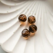 Perla rotonda irregolare sfaccettata da 12 mm in resina trasparente - Marrone scuro x4