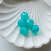 Perla rotonda irregolare sfaccettata da 14 mm in resina traslucida - Blu caraibico x1