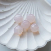 Perline sfaccettate tonde irregolari da 14 mm in resina trasparente - Rosa pallido