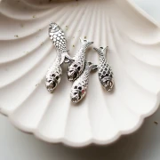 Distanziale per pesci in resina 27x9 mm - Argento x1